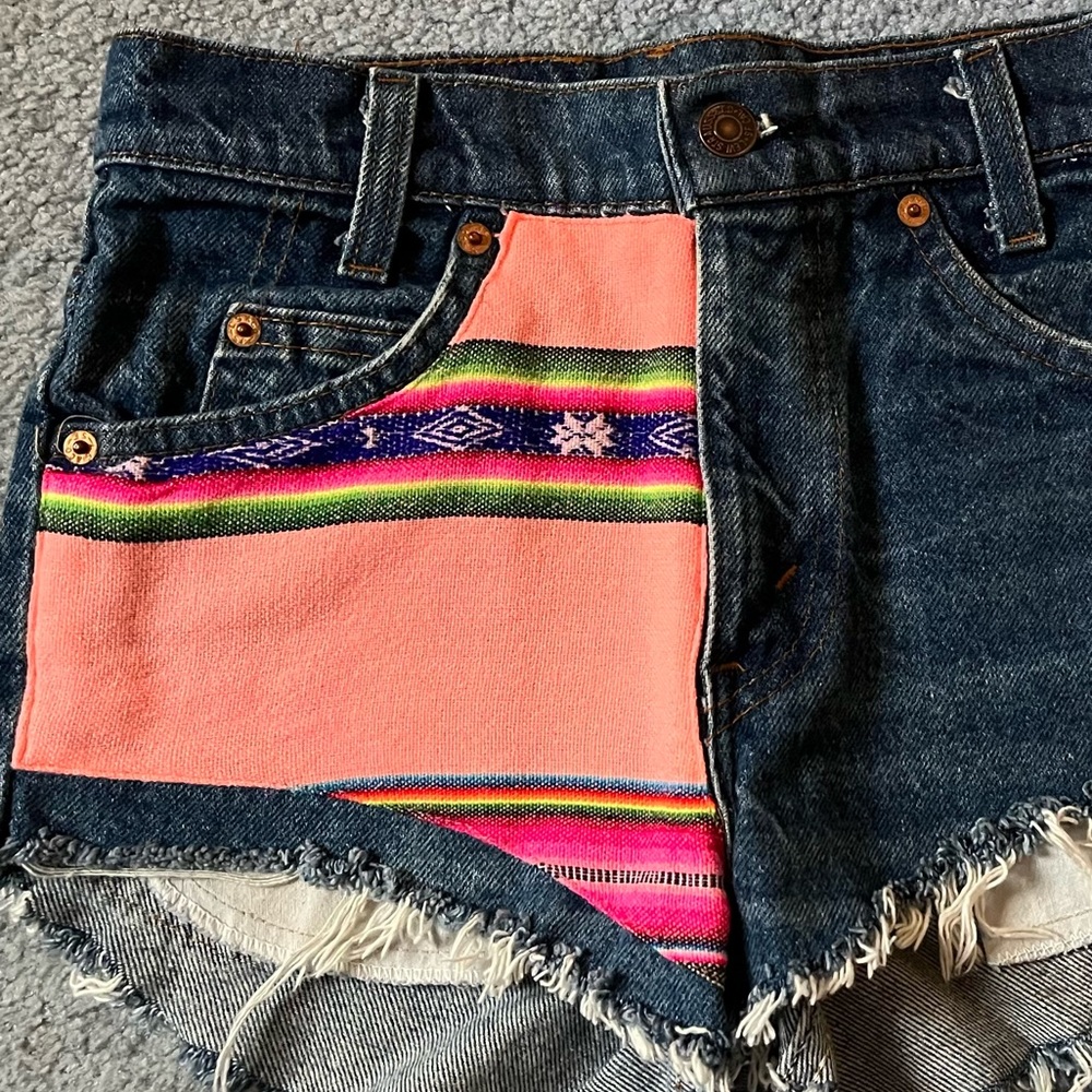 Levi’s with pink tribal detailing